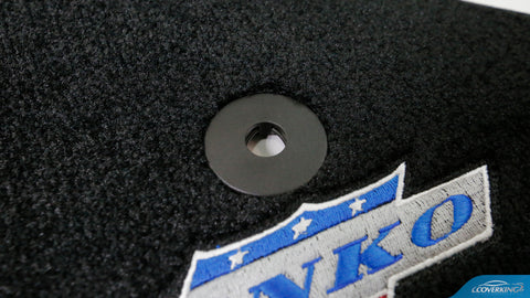 Do the Coverking Custom Floor Mats have stain protection?