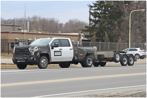 Spy Shots: '24 Silverado HD Caught Hauling Other HDs