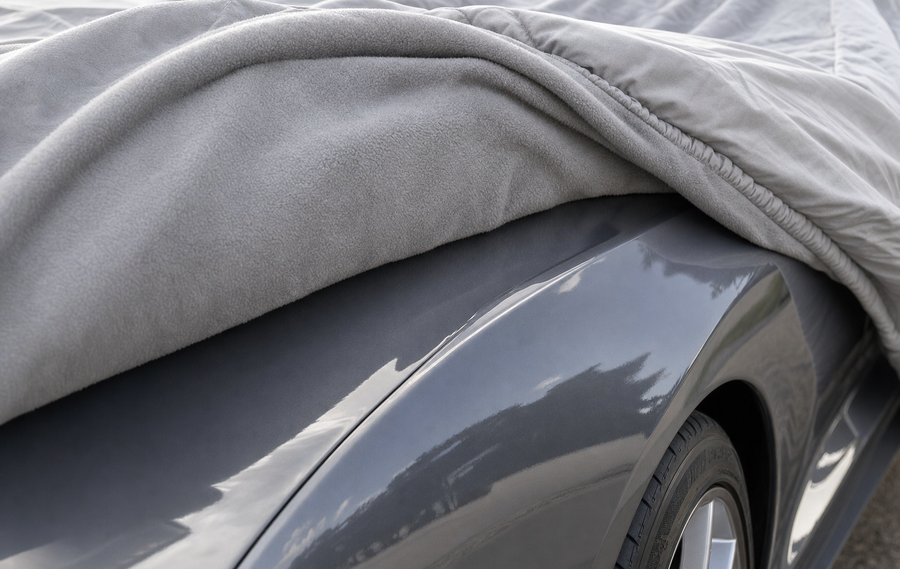 Coverking Autobody Armor car cover fleece lining pressed against a fender surface