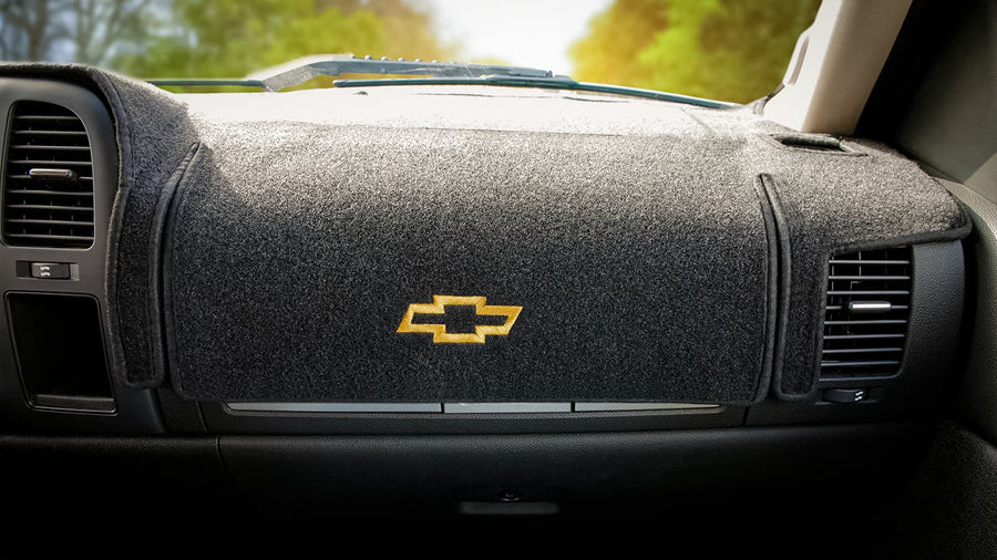 Licensed automotive embroidered logos for dash covers