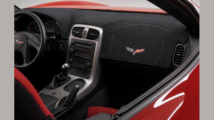Licensed automotive embroidered logos for dash covers