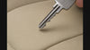 Key dragged across Coverking Ballistic seat cover fabric leaving no visible mark